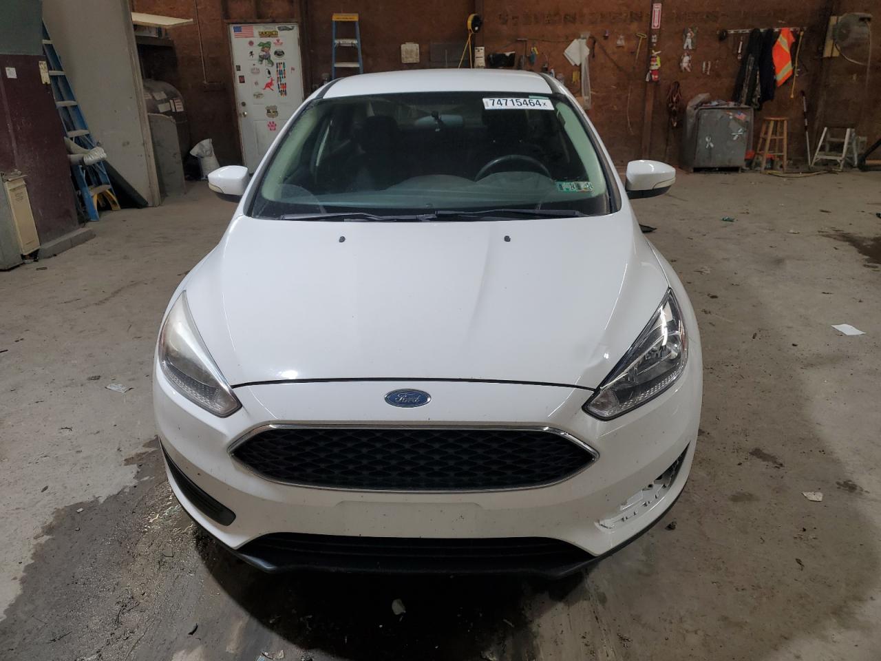 2016 Ford Focus VIN 1FADP3F21GL237425 Copart auction photo, side / front end damage thumbnail 5