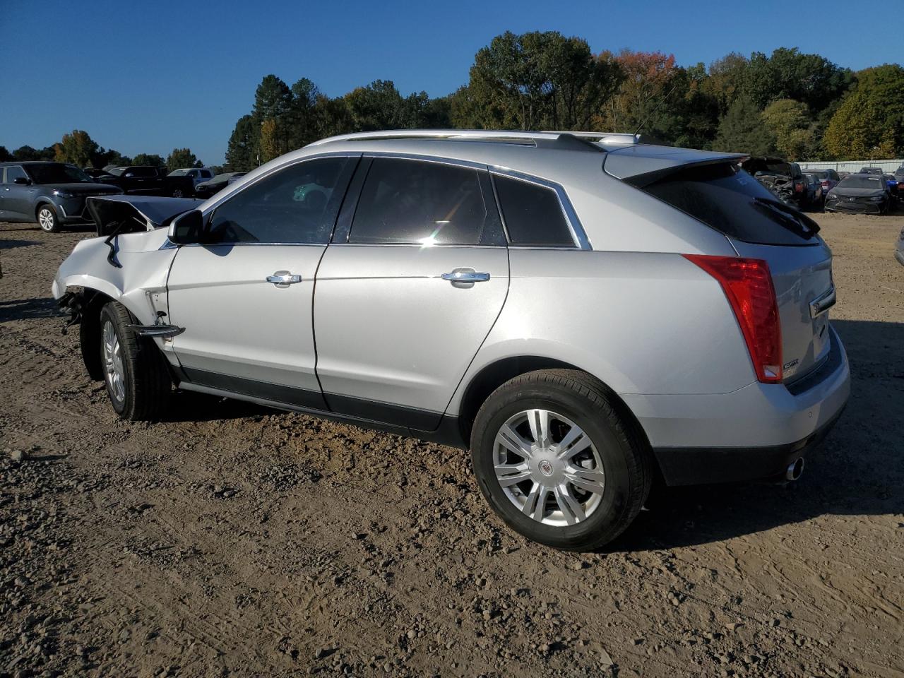 2015 Cadillac SRX VIN 3GYFNBE39FS590883 Copart auction photo, front end / minor dent/scratches damage thumbnail 2
