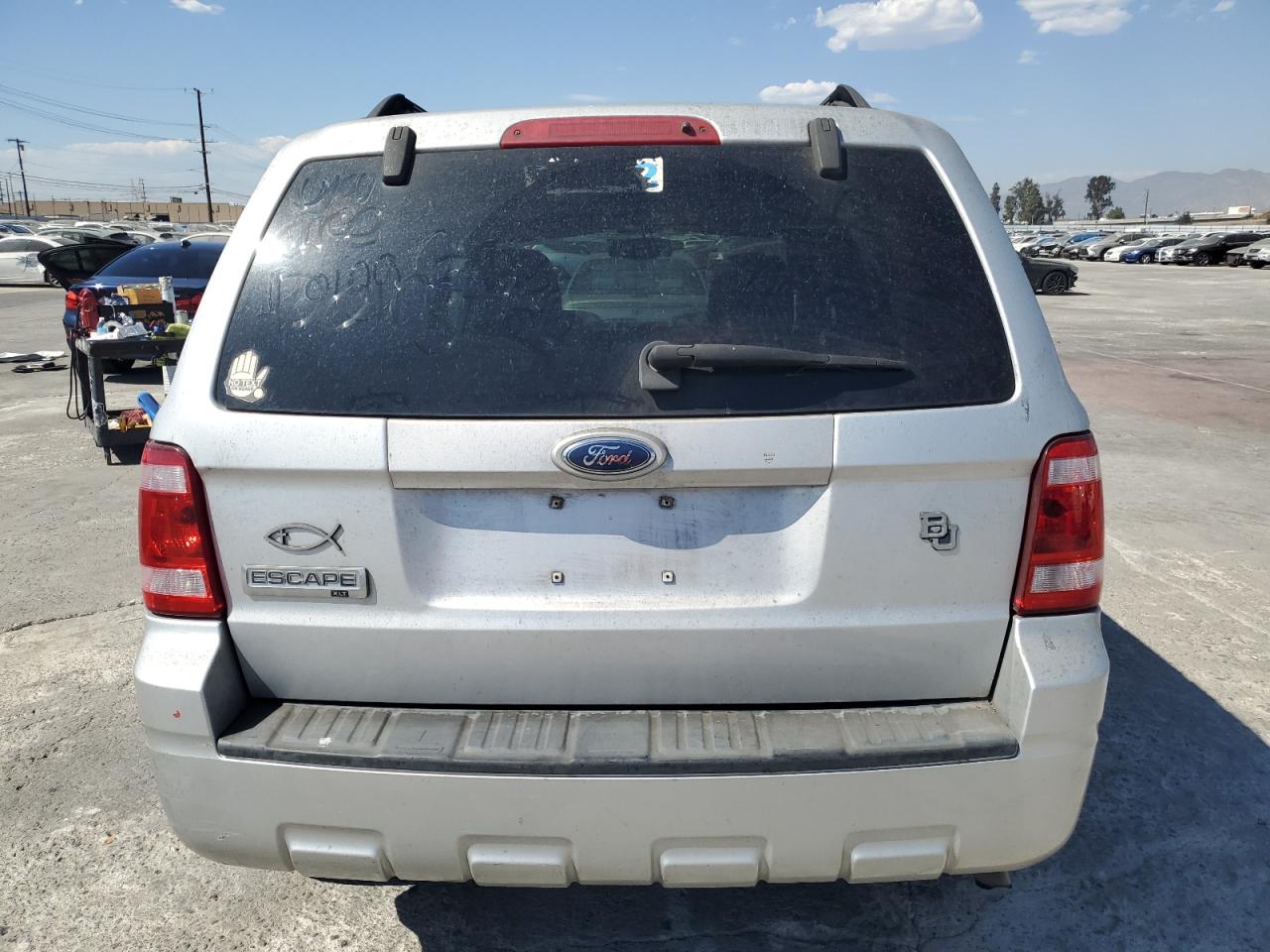 2009 Ford Escape VIN 1FMCU03G49KA18637 Copart auction photo, undercarriage / minor dent/scratches damage thumbnail 6