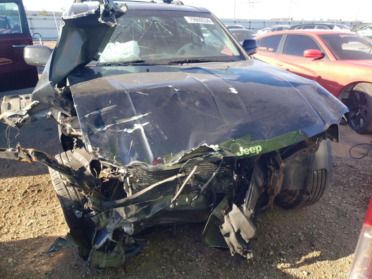 2009 Jeep Grand Cherokee VIN 1J8HR58T59C539187 Copart auction photo, front end / undercarriage damage thumbnail 5