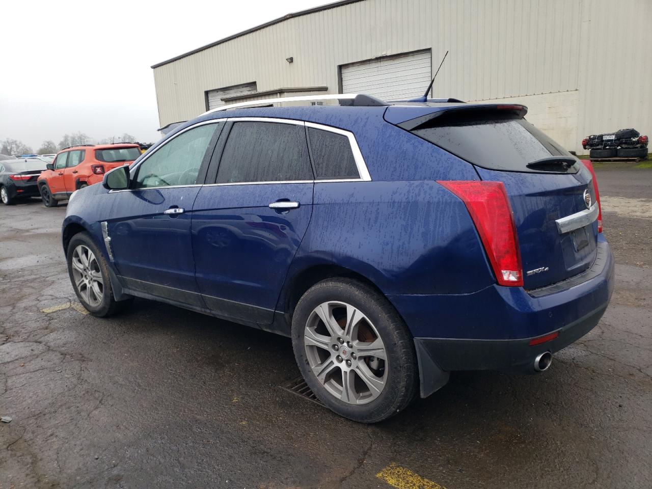 2012 Cadillac SRX VIN 3GYFNEE31CS524535 Copart auction photo, side / mechanical damage thumbnail 2