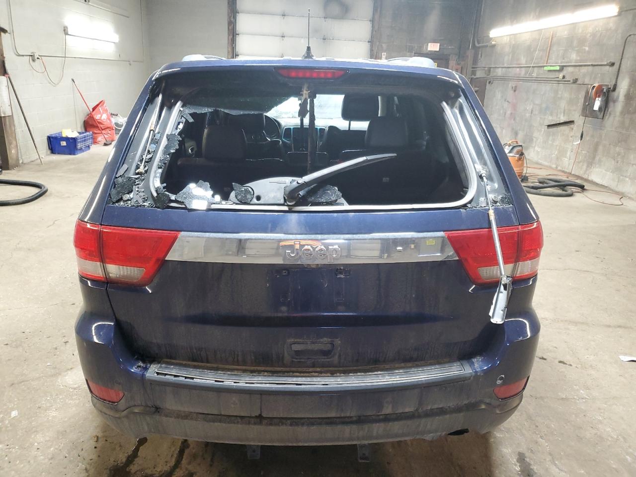 2013 Jeep Grand Cherokee VIN 1C4RJFAG4DC502968 Copart auction photo, side / vandalism damage thumbnail 6