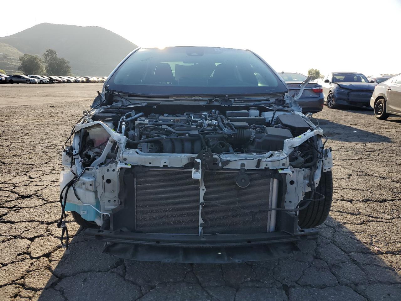 2020 Toyota Corolla VIN 5YFS4RCE5LP047706 Copart auction photo, front end / side damage thumbnail 5