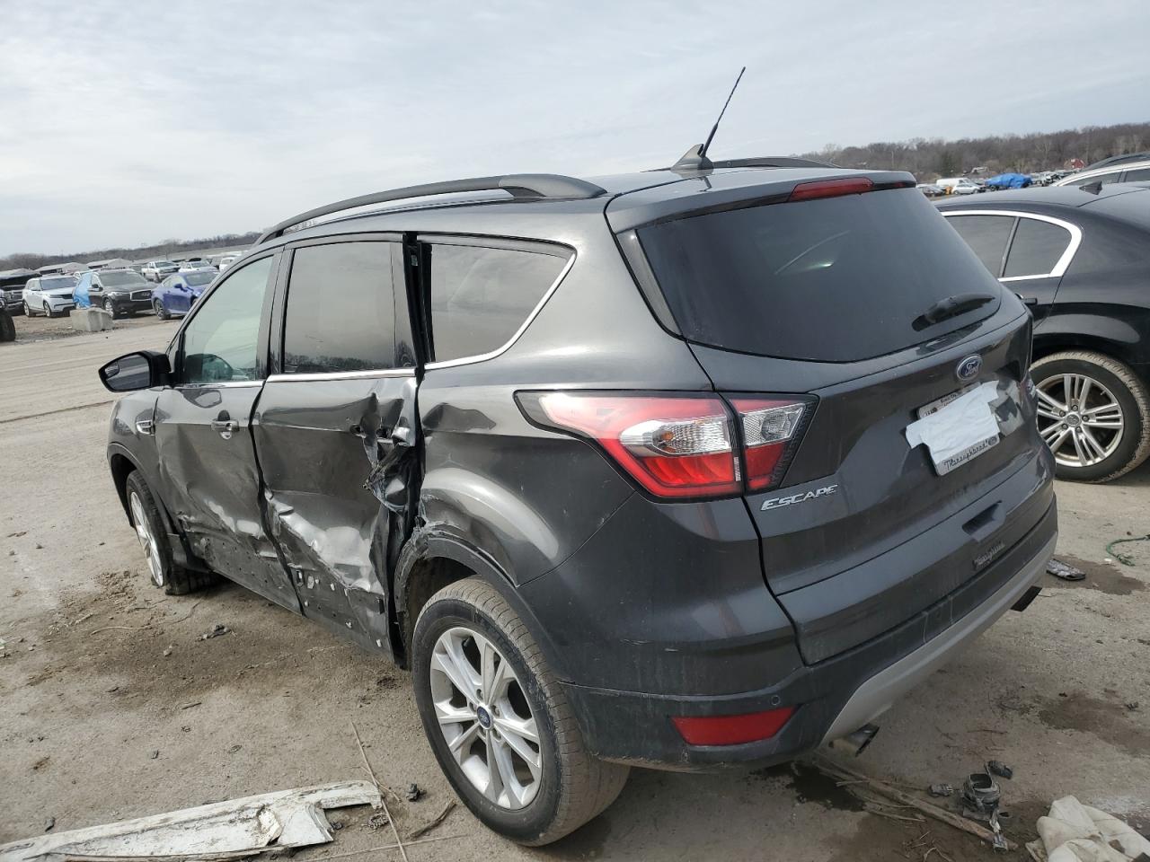 2018 Ford Escape VIN 1FMCU0HD5JUC04243 Copart auction photo, side damage thumbnail 2