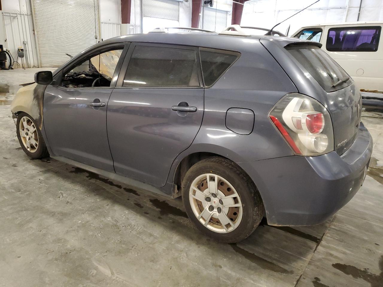 2009 Pontiac Vibe VIN 5Y2SM67039Z411455 Copart auction photo, burn damage thumbnail 2