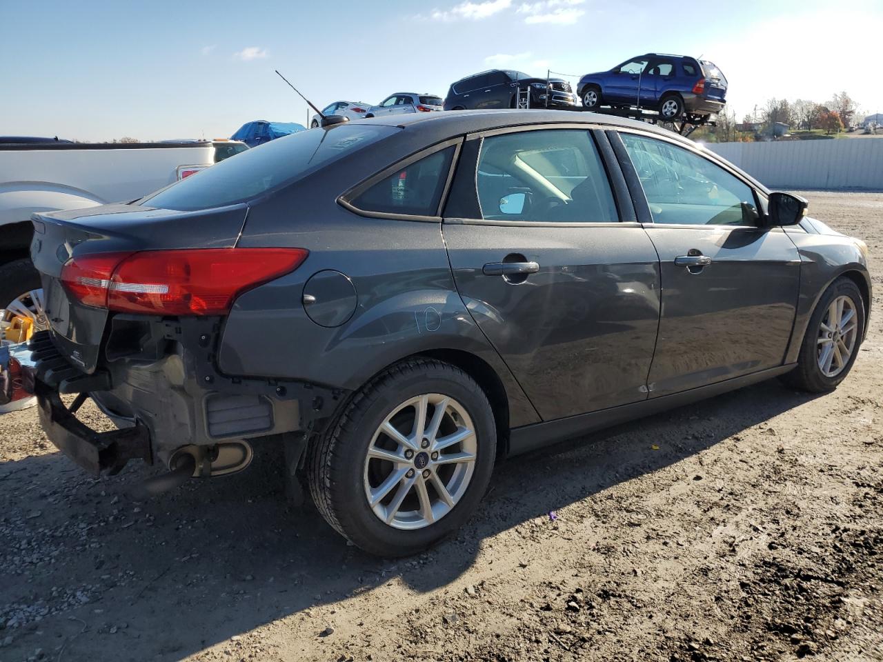 2016 Ford Focus VIN 1FADP3F2XGL310243 Copart auction photo, rear end damage thumbnail 3