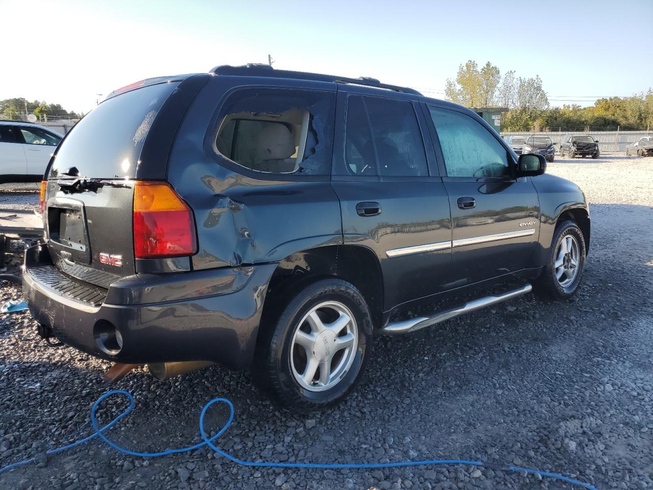 2006 GMC Envoy VIN 1GKDS13S862359872 Copart auction photo, minor dent/scratches damage thumbnail 3