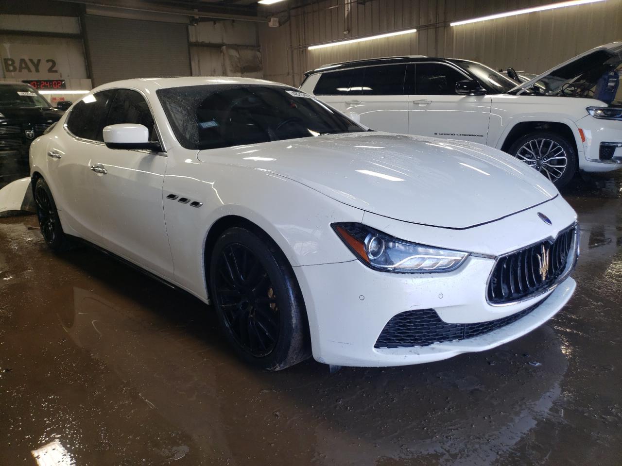 2014 Maserati Ghibli VIN ZAM57RTA4E1117703 Copart auction photo, rear end damage thumbnail 4