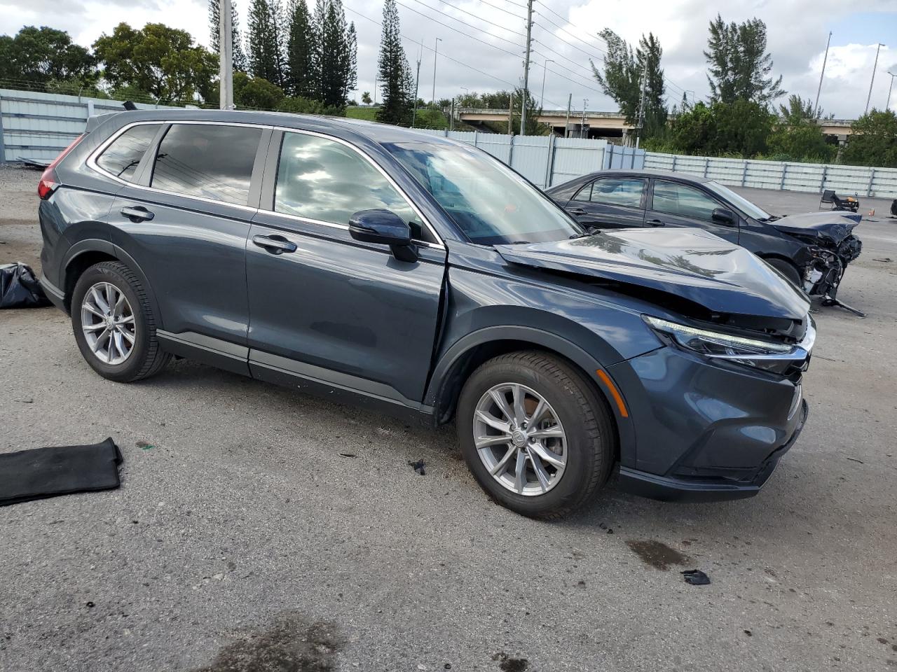 2023 Honda CR-V VIN 5J6RS3H74PL003815 Copart auction photo, front end damage thumbnail 4