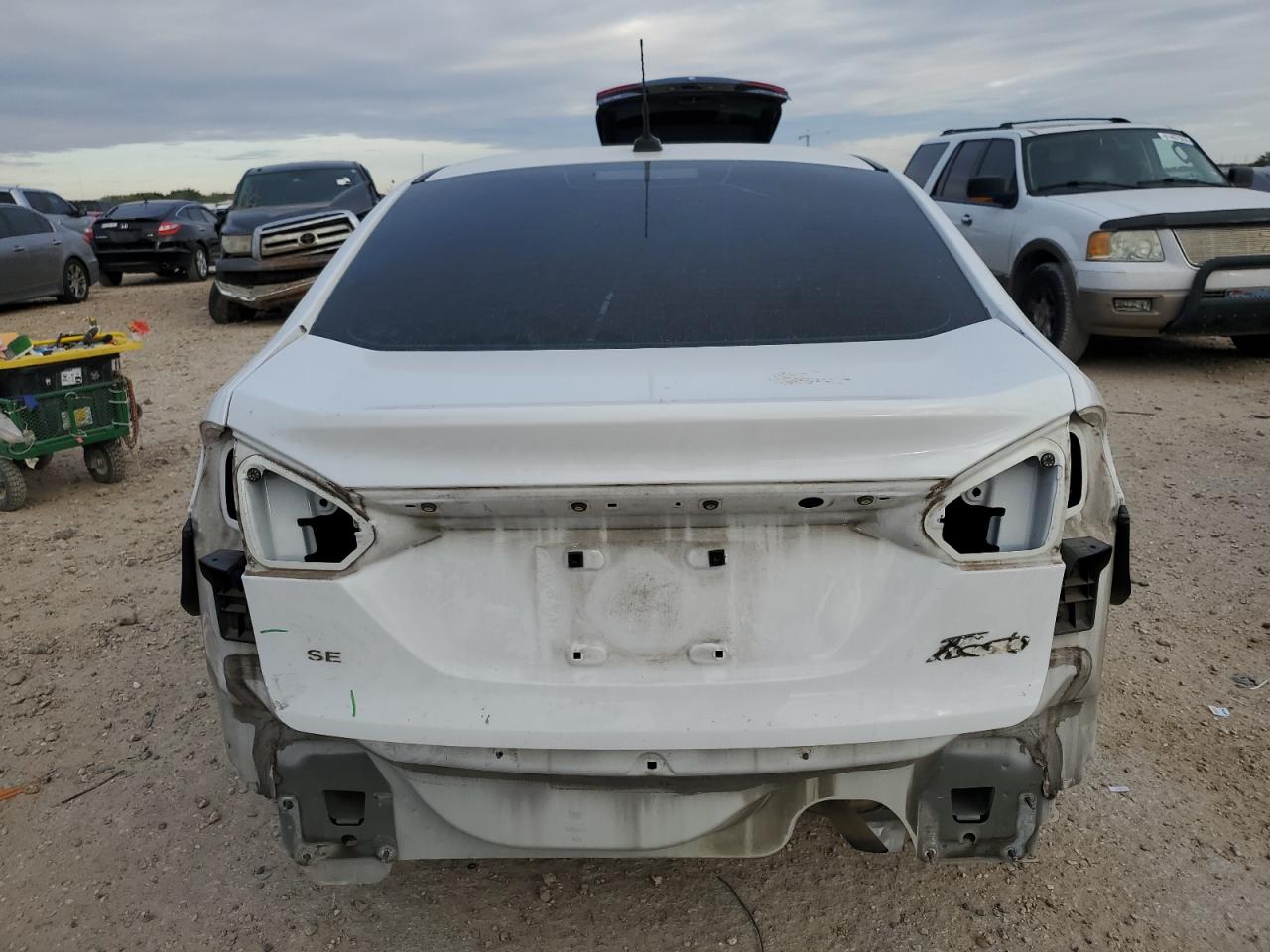 2016 Ford Fiesta VIN 3FADP4BJ5GM206681 Copart auction photo, rear end damage thumbnail 6
