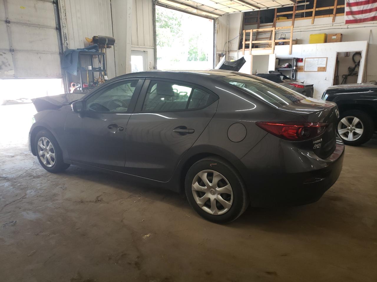 2017 Mazda 3 VIN 3MZBN1U77HM137031 Copart auction photo, front end / rear end damage thumbnail 2