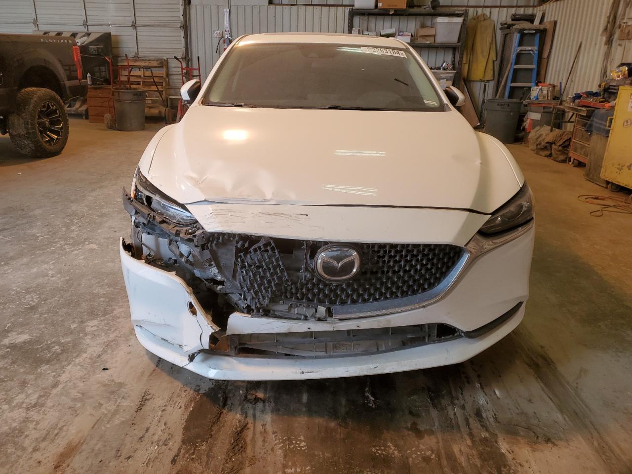 2021 Mazda 6 VIN JM1GL1VM4M1619983 Copart auction photo, front end / minor dent/scratches damage thumbnail 5