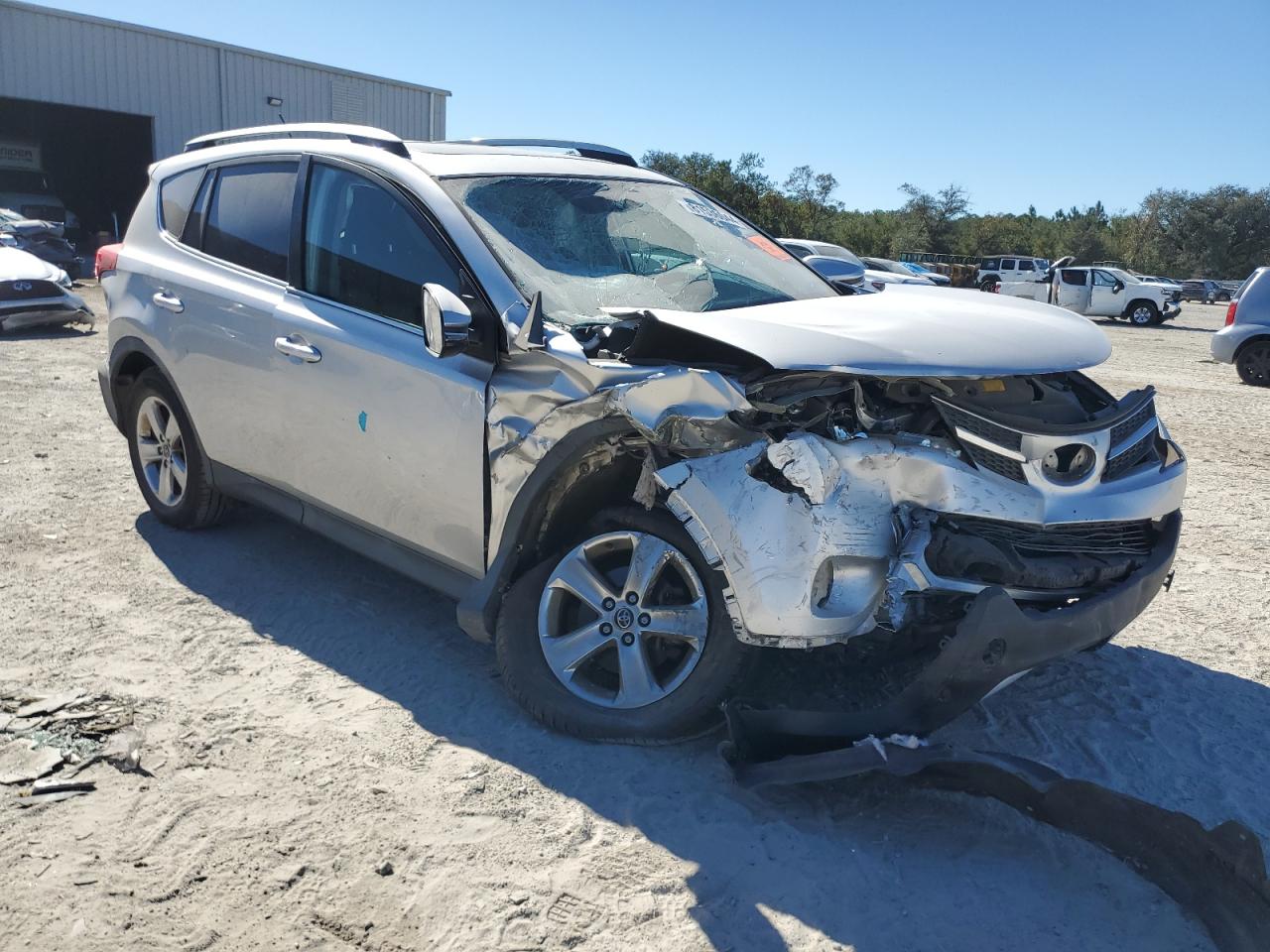 2015 Toyota RAV 4 VIN 2T3WFREV5FW164835 Copart auction photo, front end / rear end damage thumbnail 4