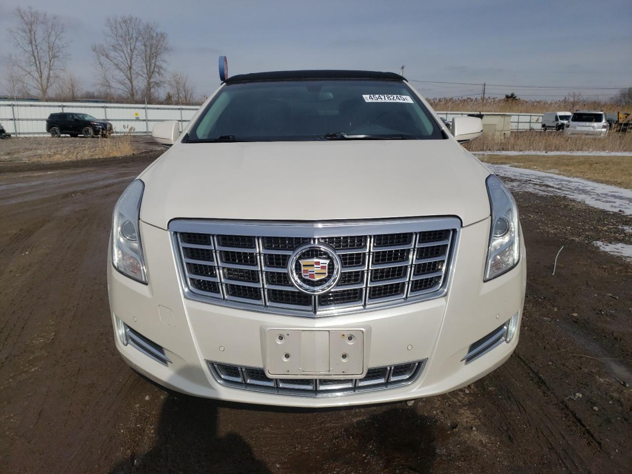 2014 Cadillac XTS VIN 2G61M5S33E9136748 Copart auction photo, side / rear end damage thumbnail 5