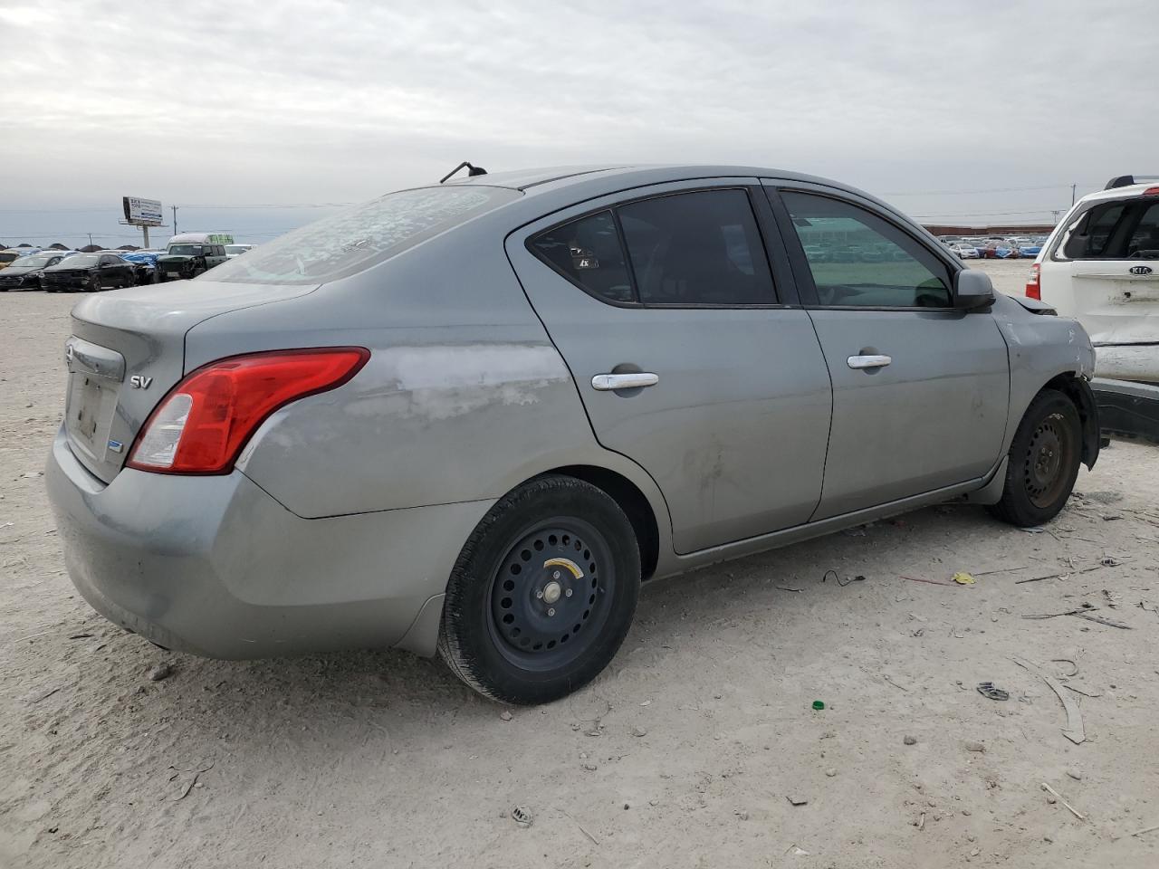 2012 Nissan Versa VIN 3N1CN7AP6CL932751 Copart auction photo, front end damage thumbnail 3