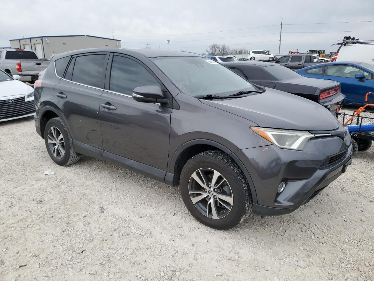 2018 Toyota RAV 4 VIN 2T3WFREVXJW410335 Copart auction photo, vandalism damage thumbnail 4
