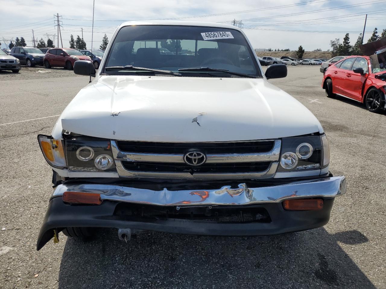 1999 Toyota Tacoma VIN 4TAVL52N6XZ407244 Copart auction photo, front end damage thumbnail 5
