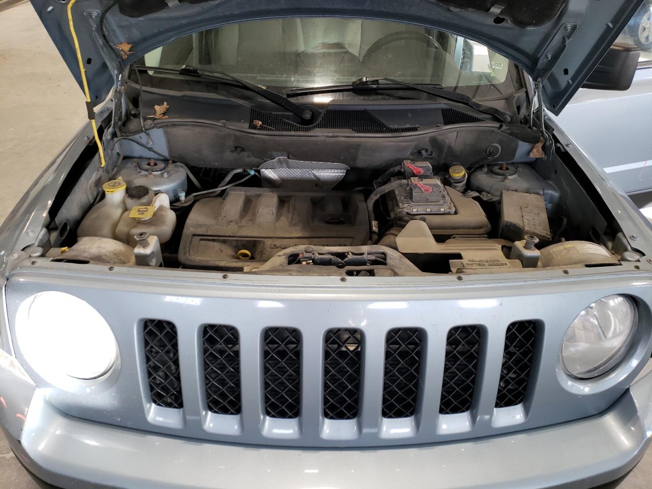 2014 Jeep Liberty (Patriot) VIN 1C4NJRFB1ED500765 Copart auction photo, rear end damage thumbnail 12