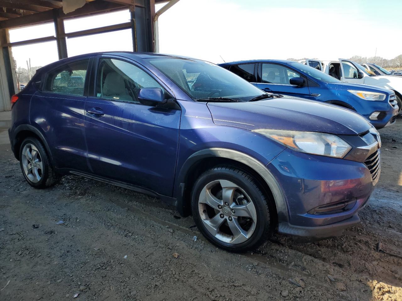 2016 Honda HR-V VIN 3CZRU5H33GM749657 Copart auction photo, side / rear end damage thumbnail 4