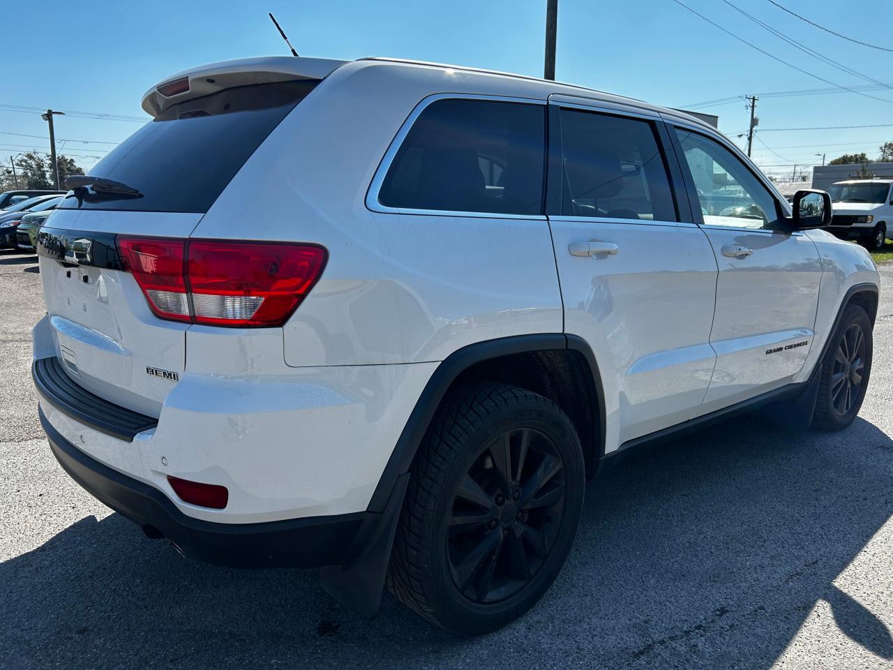 2012 Jeep Grand Cherokee VIN 1C4RJFAT5CC330171 Copart auction photo, normal wear damage thumbnail 4
