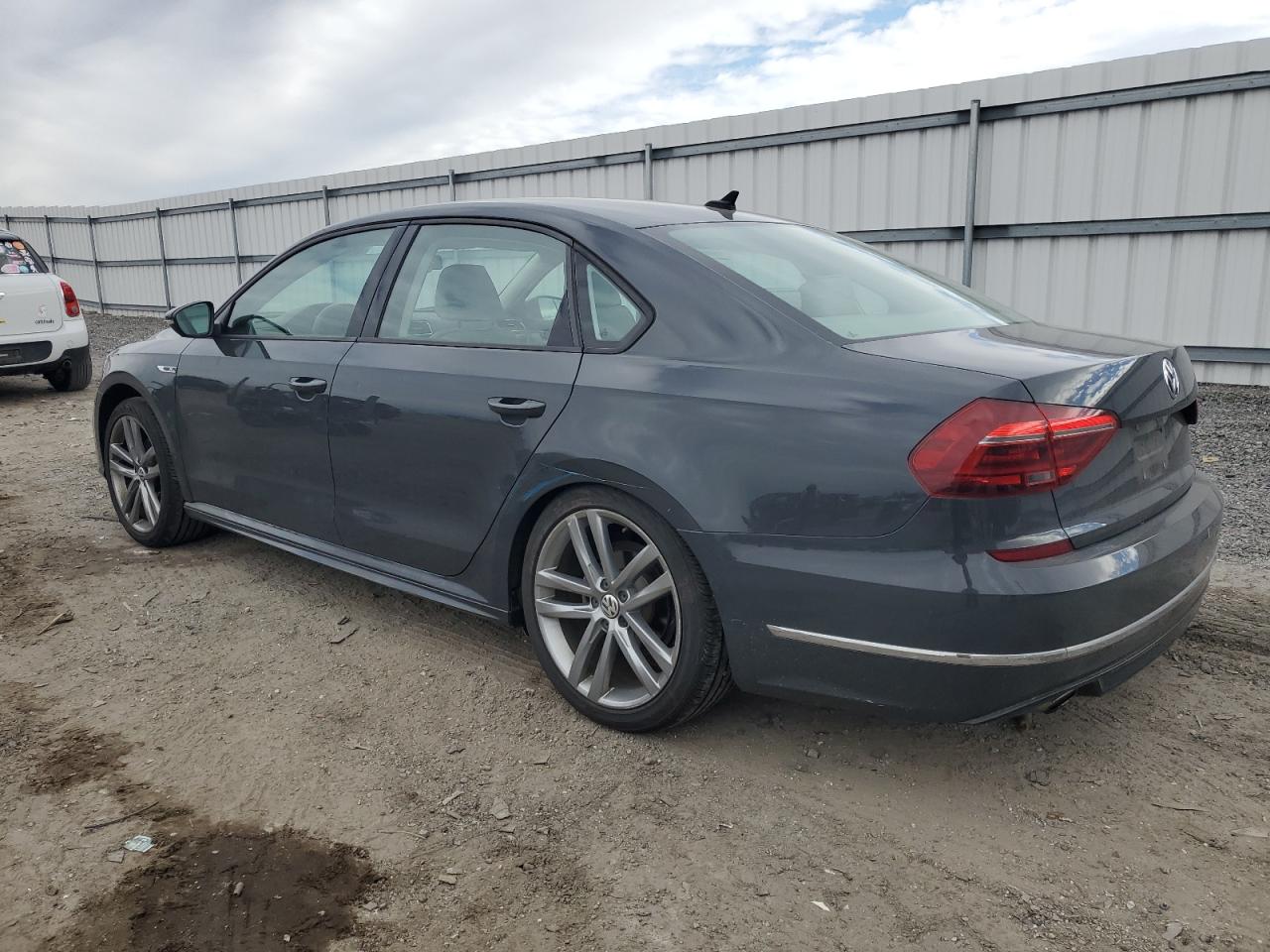 2018 Volkswagen Passat VIN 1VWAA7A3XJC016139 Copart auction photo, undercarriage / minor dent/scratches damage thumbnail 2