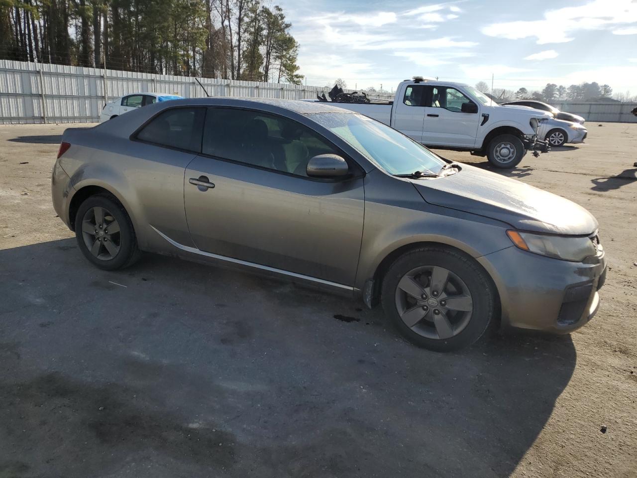 2011 KIA Forte VIN KNAFU6A23B5318117 Copart auction photo, front end damage thumbnail 4