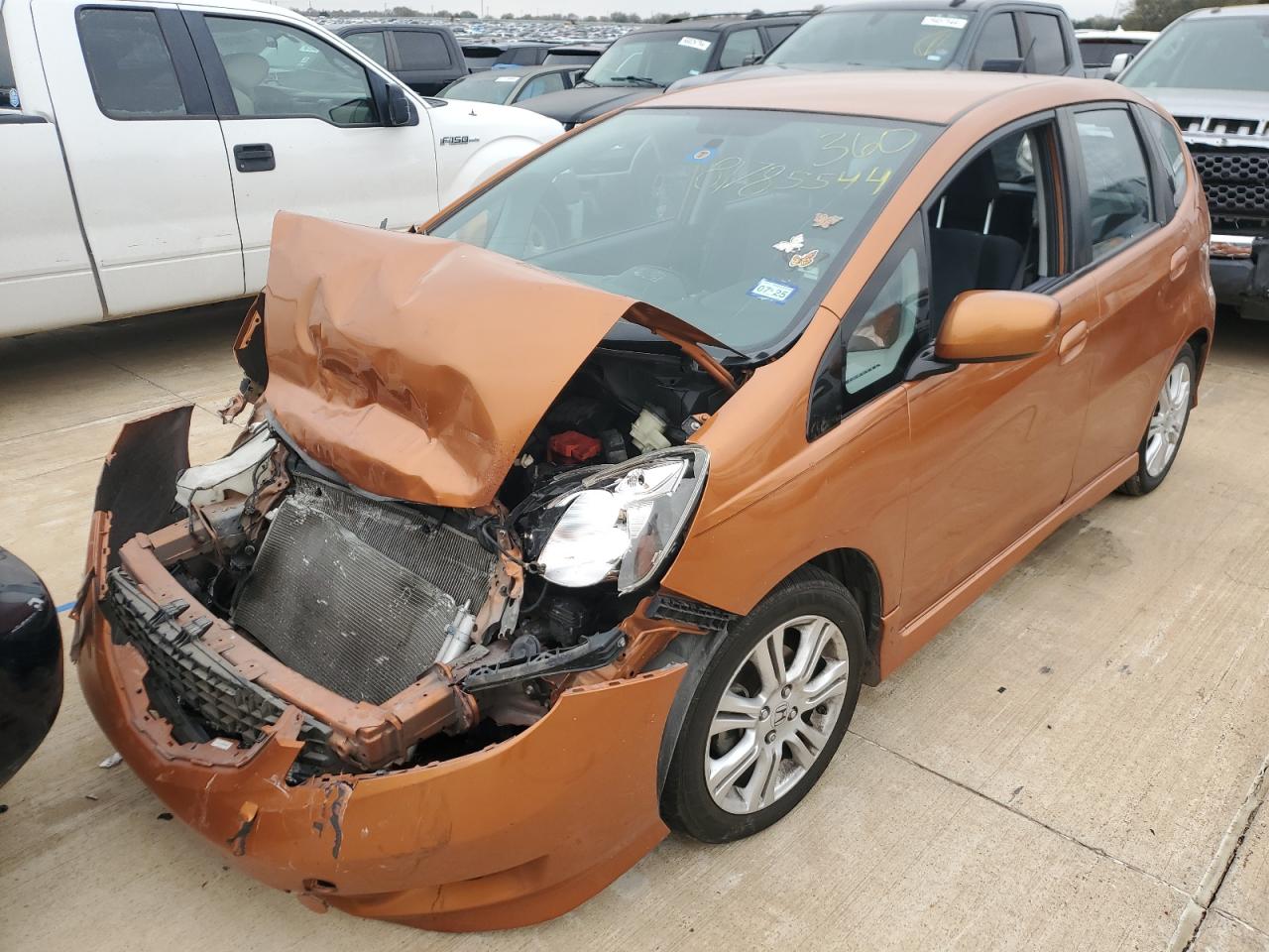 2009 Honda Fit VIN JHMGE88489S066382 Copart auction photo, front end / side damage thumbnail 5