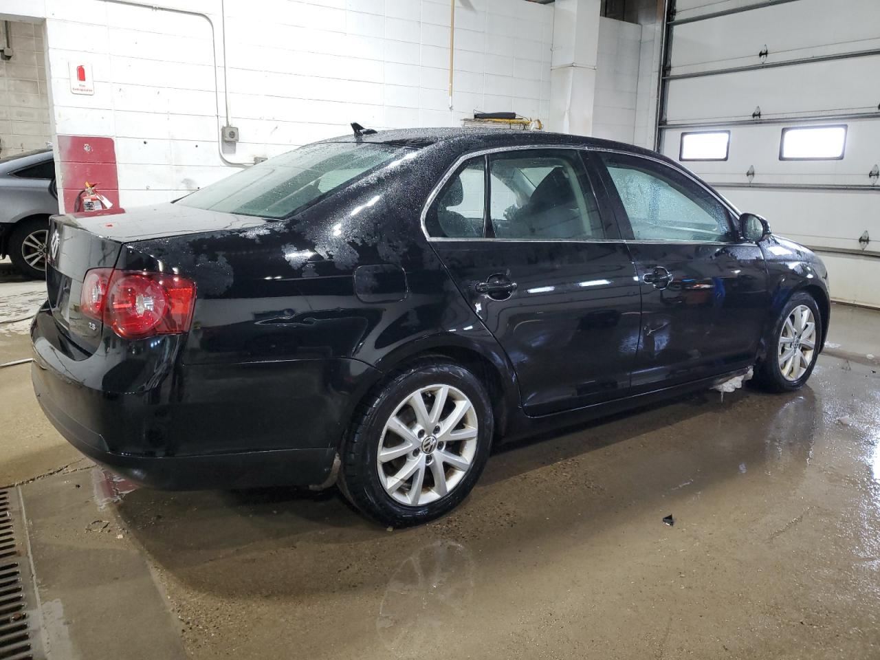 2010 Volkswagen Jetta VIN 3VWRX7AJ4AM049541 Copart auction photo, side / front end damage thumbnail 3