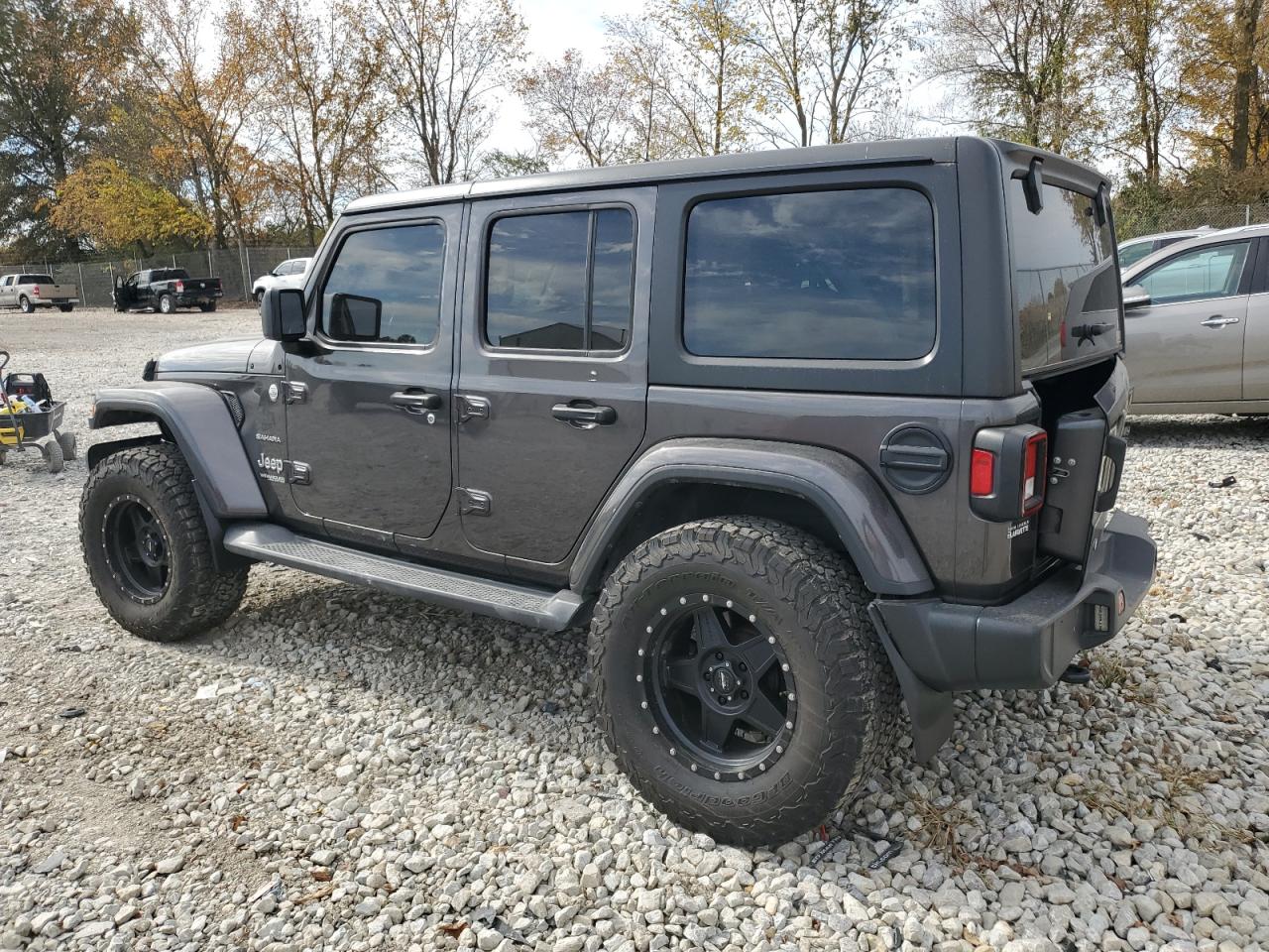 2018 Jeep Wrangler VIN 1C4HJXENXJW325802 Copart auction photo, rear end / minor dent/scratches damage thumbnail 2