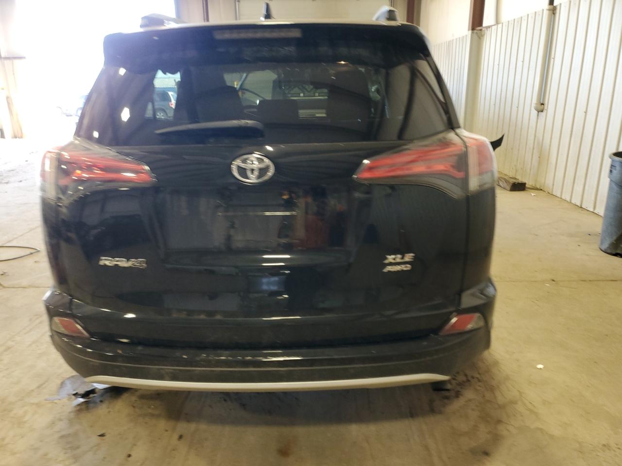 2016 Toyota RAV 4 VIN 2T3RFREV0GW514273 Copart auction photo, front end / side damage thumbnail 6