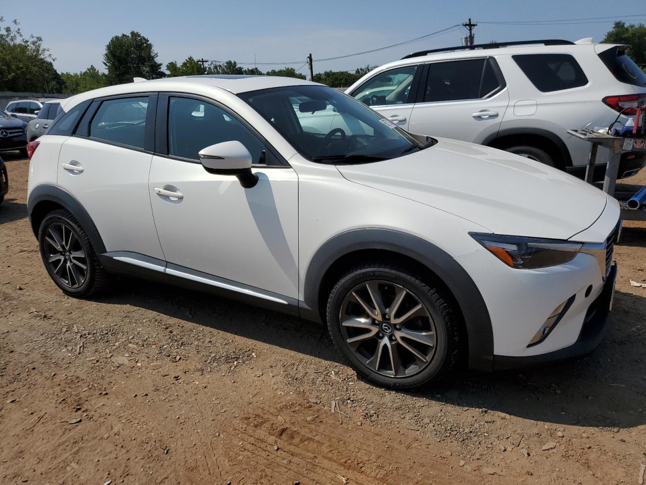 2017 Mazda CX-3 VIN JM1DKFD77H0141102 Copart auction photo, water/flood damage thumbnail 4