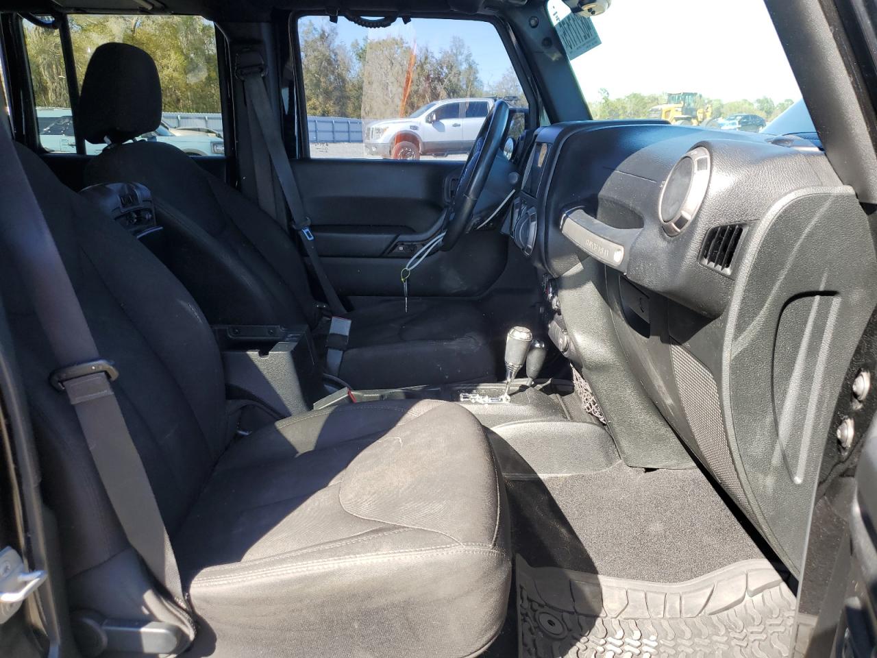 2015 Jeep Wrangler VIN 1C4BJWDGXFL560826 Copart auction photo, side / front end damage thumbnail 7