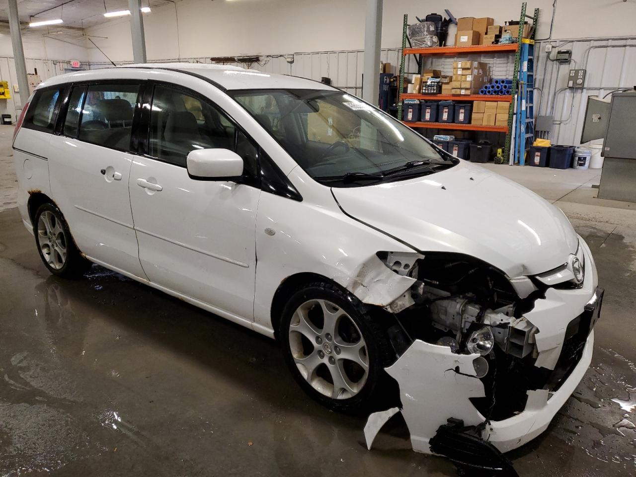 2009 Mazda 5 VIN JM1CR293290347743 Copart auction photo, front end / side damage thumbnail 4