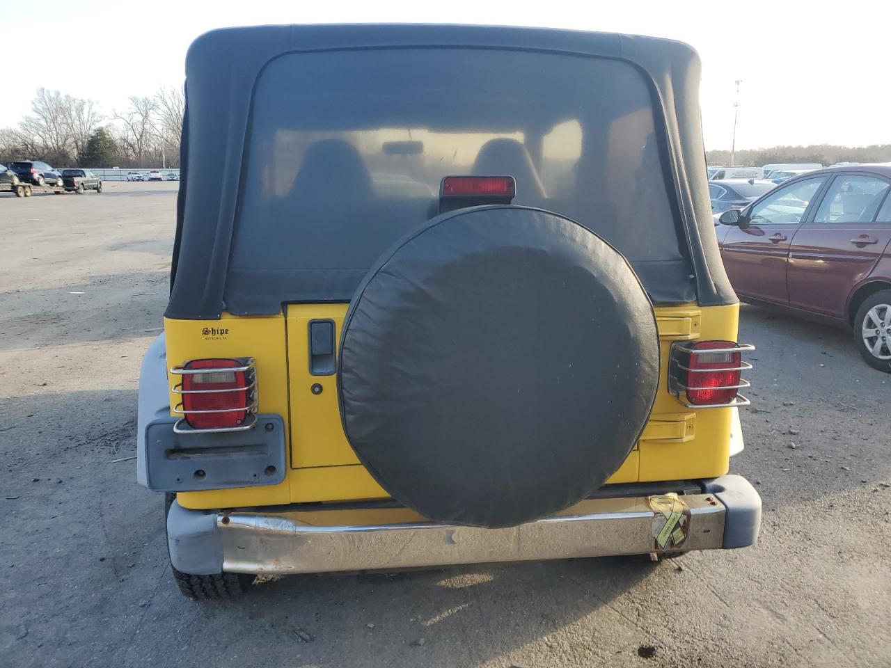 2000 Jeep Wrangler VIN 1J4FA29PXYP775373 Copart auction photo, normal wear / minor dent/scratches damage thumbnail 6