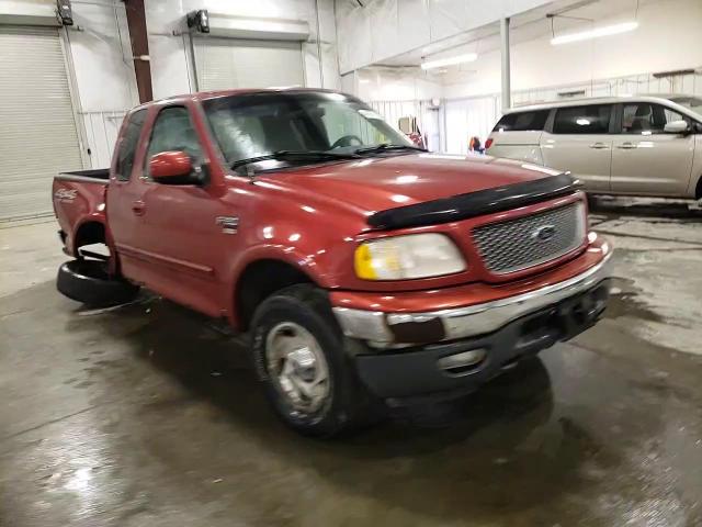 1999 Ford F-150 VIN 1FTRX18LXXNC09573 Copart auction photo, side / hail damage thumbnail 11