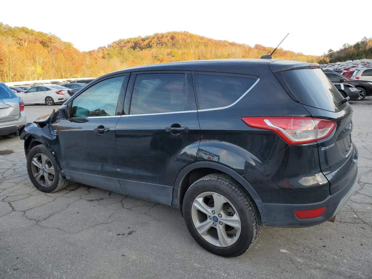 2015 Ford Escape VIN 1FMCU9GX8FUB35510 Copart auction photo, front end / side damage thumbnail 2