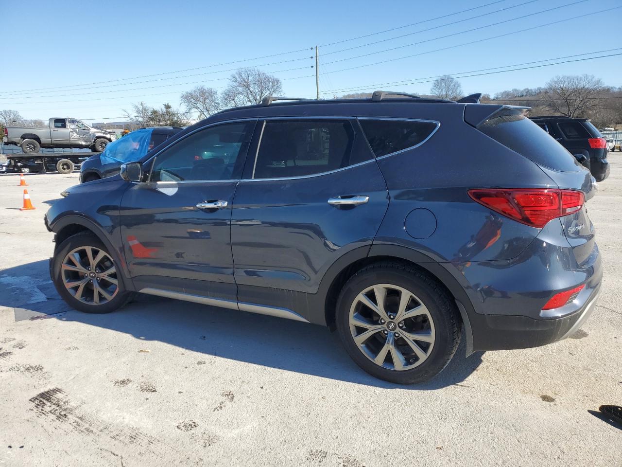 2017 Hyundai Santa Fe VIN 5XYZW4LAXHG486677 Copart auction photo, front end damage thumbnail 2
