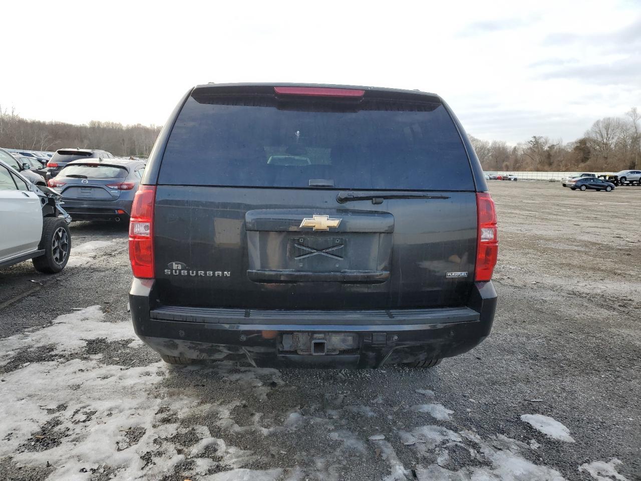 2009 Chevrolet Suburban VIN 1GNFK26359R300795 Copart auction photo, front end damage thumbnail 6