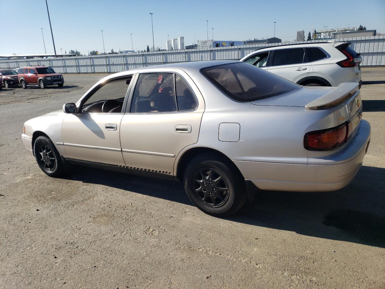 1995 Toyota Camry VIN JT2SK12E8S0286063 Copart auction photo, side / front end damage thumbnail 2