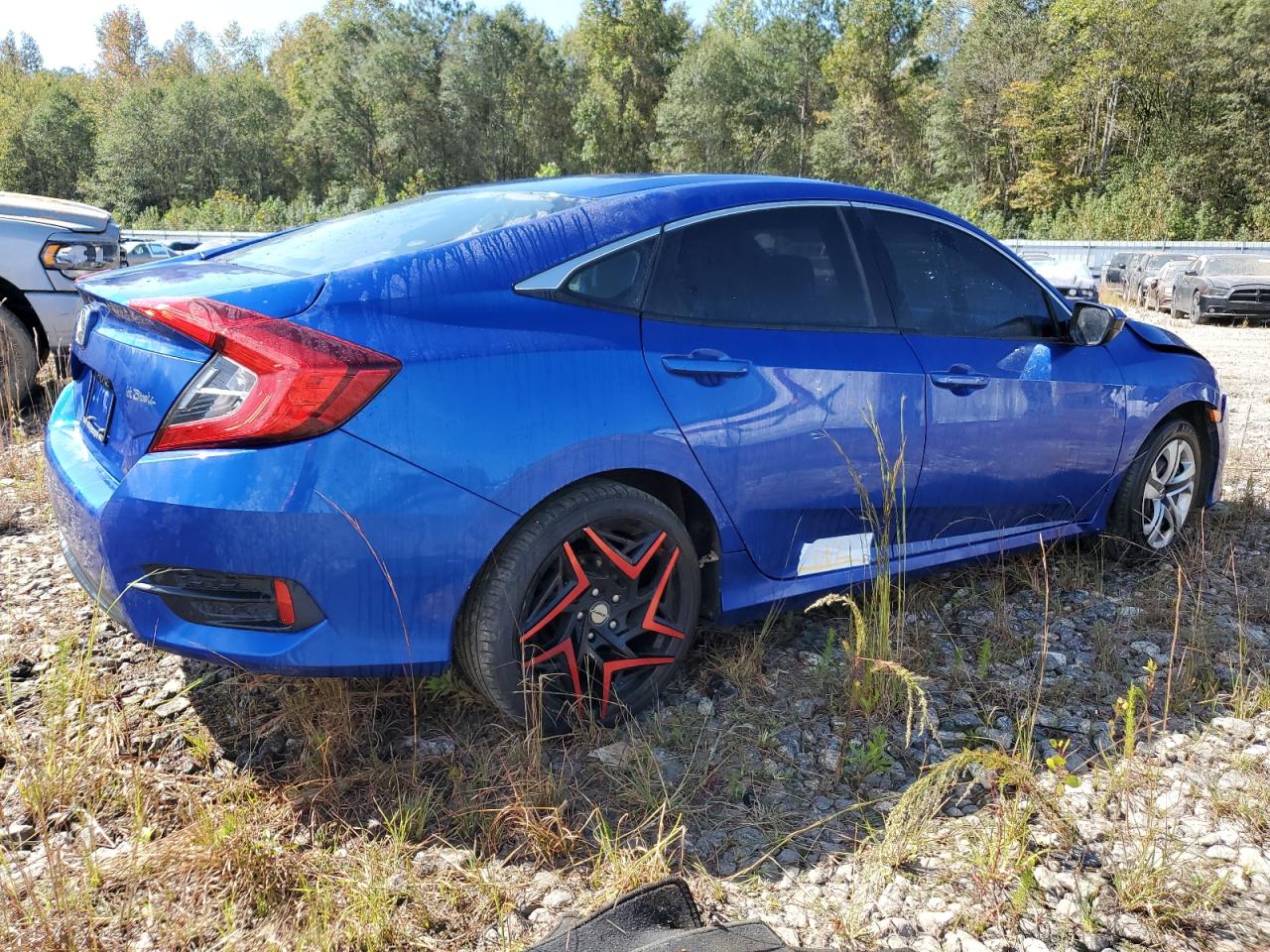 2018 Honda Civic VIN 19XFC2F51JE207490 Copart auction photo, side / front end damage thumbnail 3