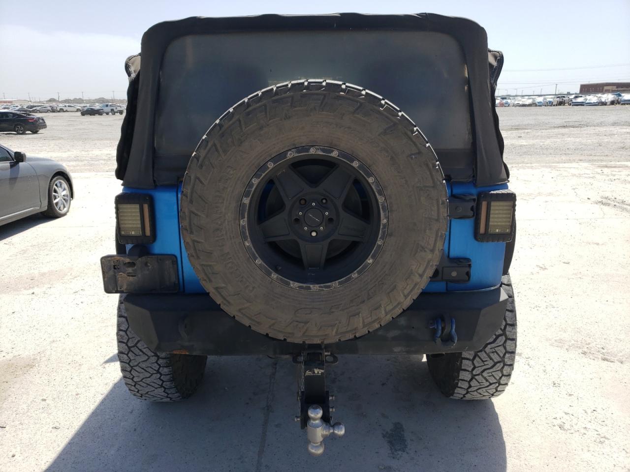 2015 Jeep Wrangler VIN 1C4BJWCG9FL552122 Copart auction photo, undercarriage / minor dent/scratches damage thumbnail 6