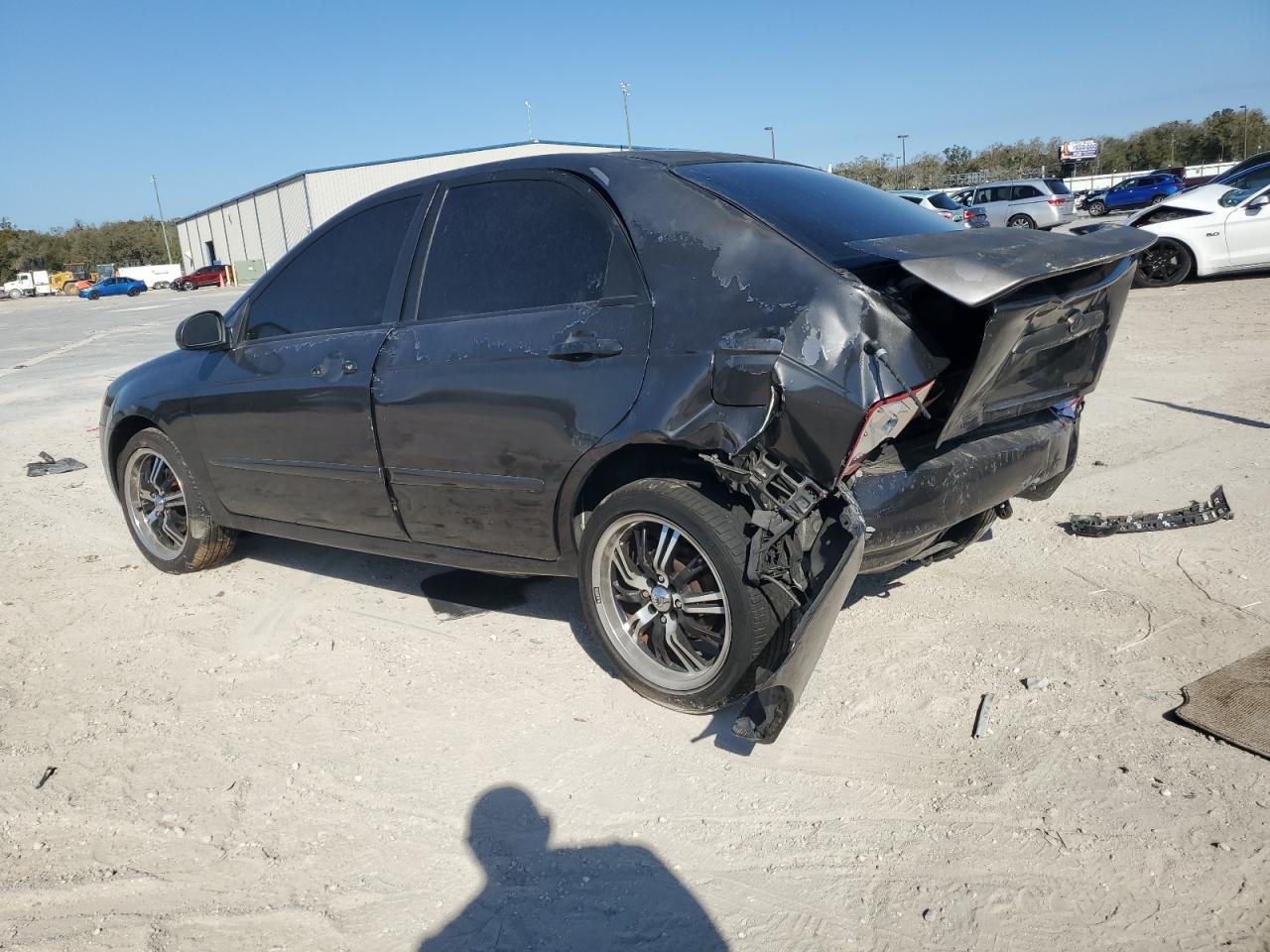 2004 KIA Spectra VIN KNAFE121745055316 Copart auction photo, all over damage thumbnail 2