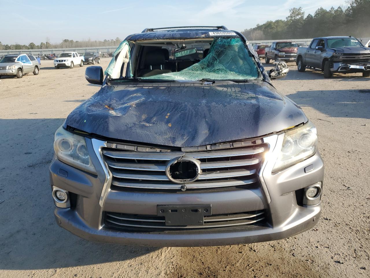 2015 Lexus LX VIN JTJHY7AX9F4166130 Copart auction photo, front end / side damage thumbnail 5
