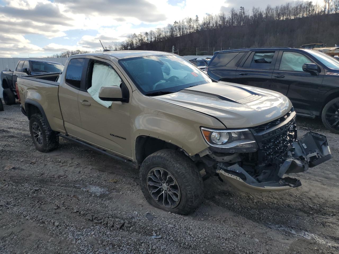2021 Chevrolet Colorado VIN 1GCRTEEN2M1187631 Copart auction photo, all over damage thumbnail 4