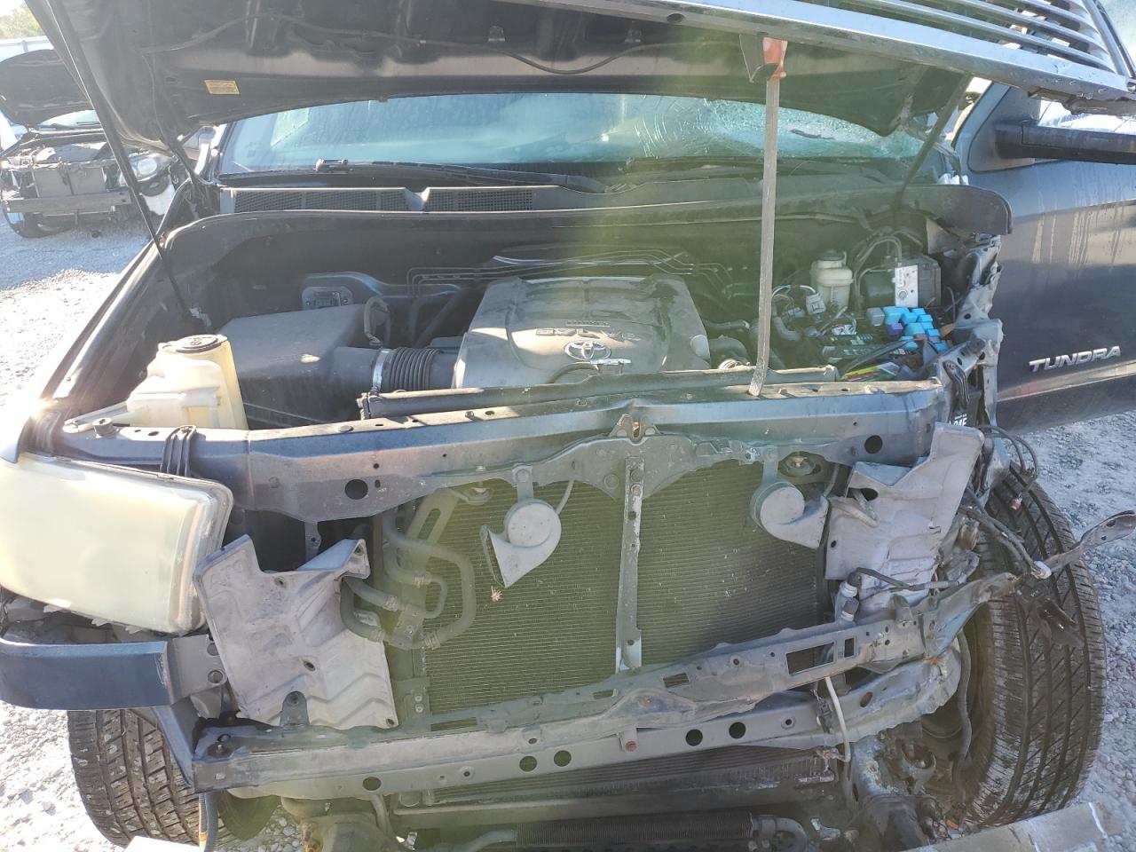 2010 Toyota Tundra VIN 5TFHW5F13AX128594 Copart auction photo, front end damage thumbnail 12