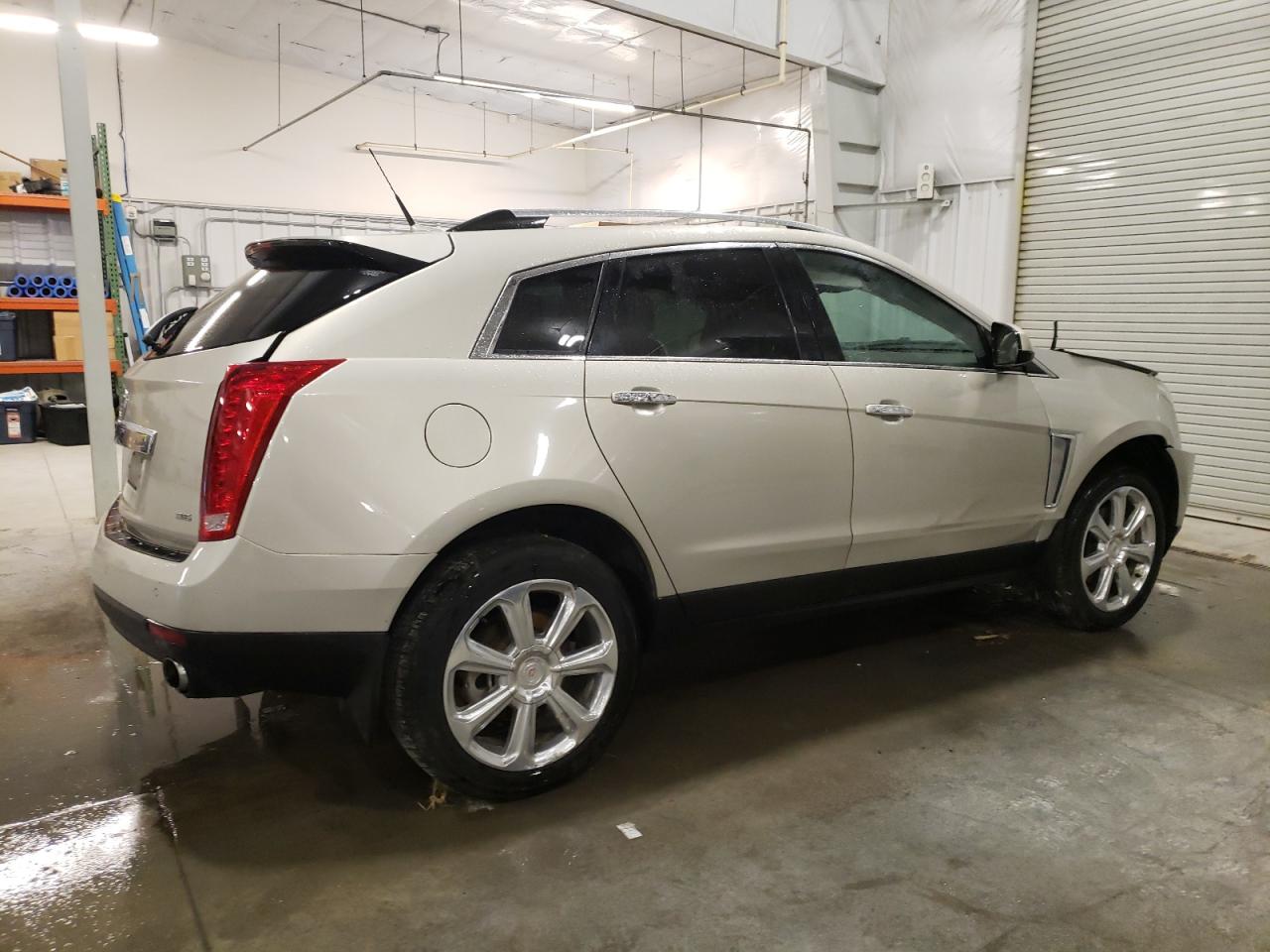 2014 Cadillac SRX VIN 3GYFNGE31ES627002 Copart auction photo, front end / rear end damage thumbnail 3