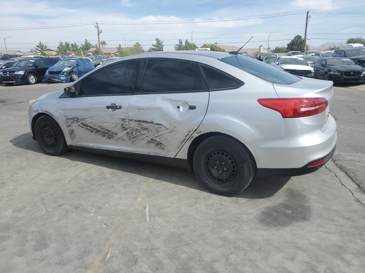2017 Ford Focus VIN 1FADP3E28HL314908 Copart auction photo, all over damage thumbnail 2