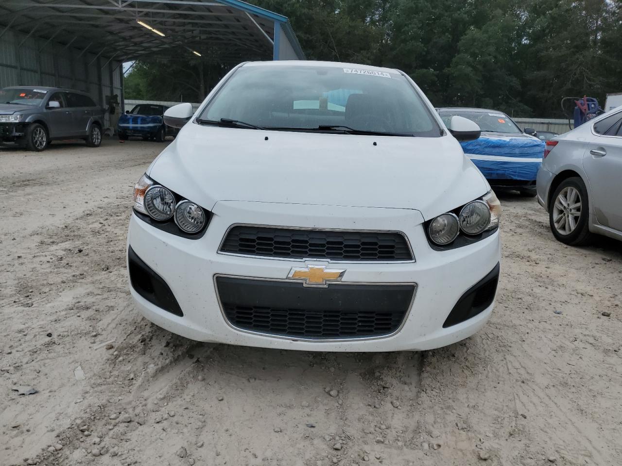 2014 Chevrolet Sonic VIN 1G1JC5SHXE4141999 Copart auction photo, rear end damage thumbnail 5