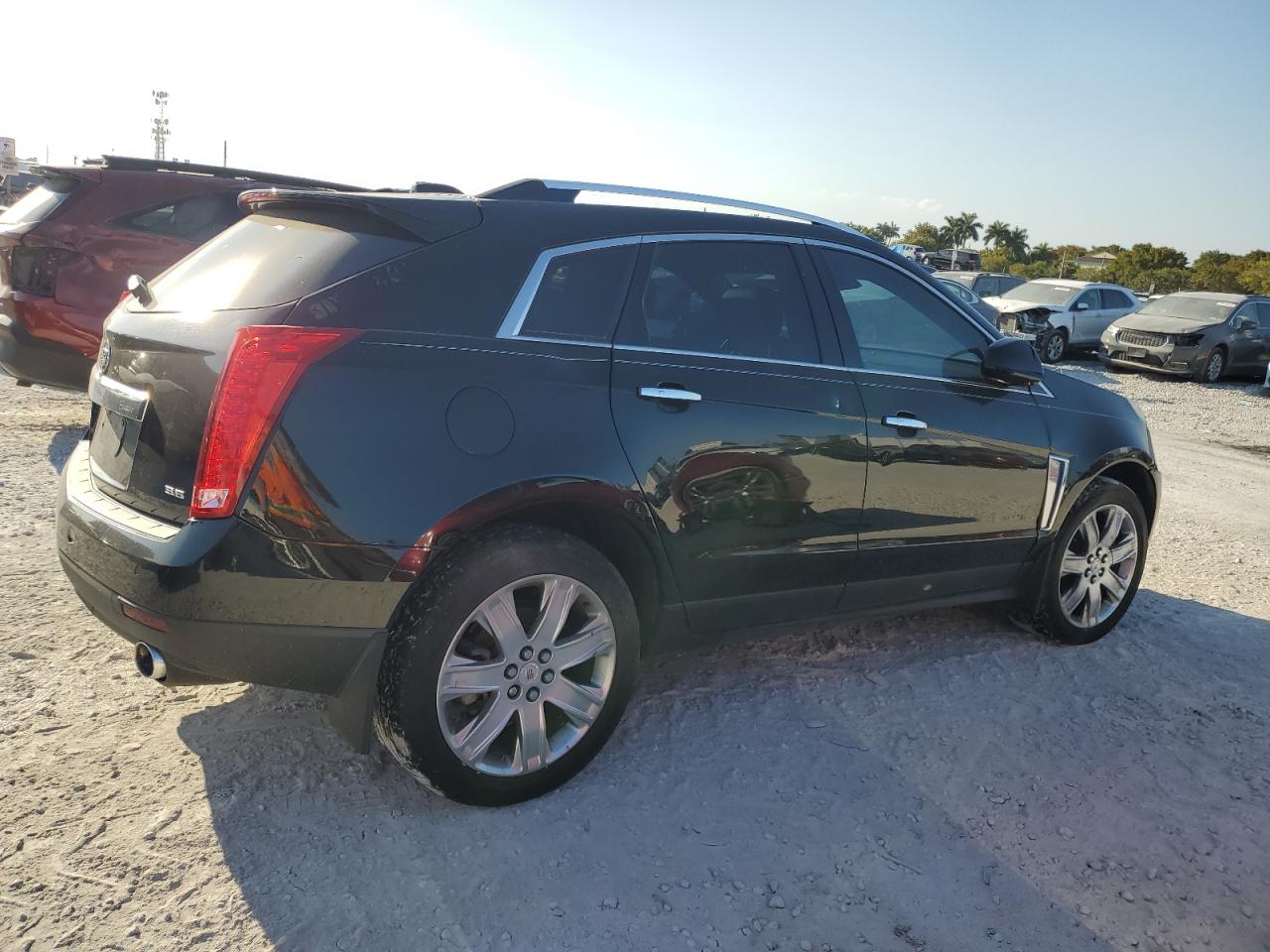 2016 Cadillac SRX VIN 3GYFNBE33GS543866 Copart auction photo, front end damage thumbnail 3