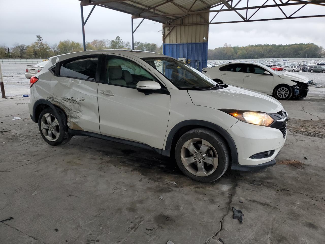 2016 Honda HR-V VIN 3CZRU5H53GM724047 Copart auction photo, rear end / side damage thumbnail 4